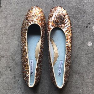 Metallic “mermaid rebel” flats